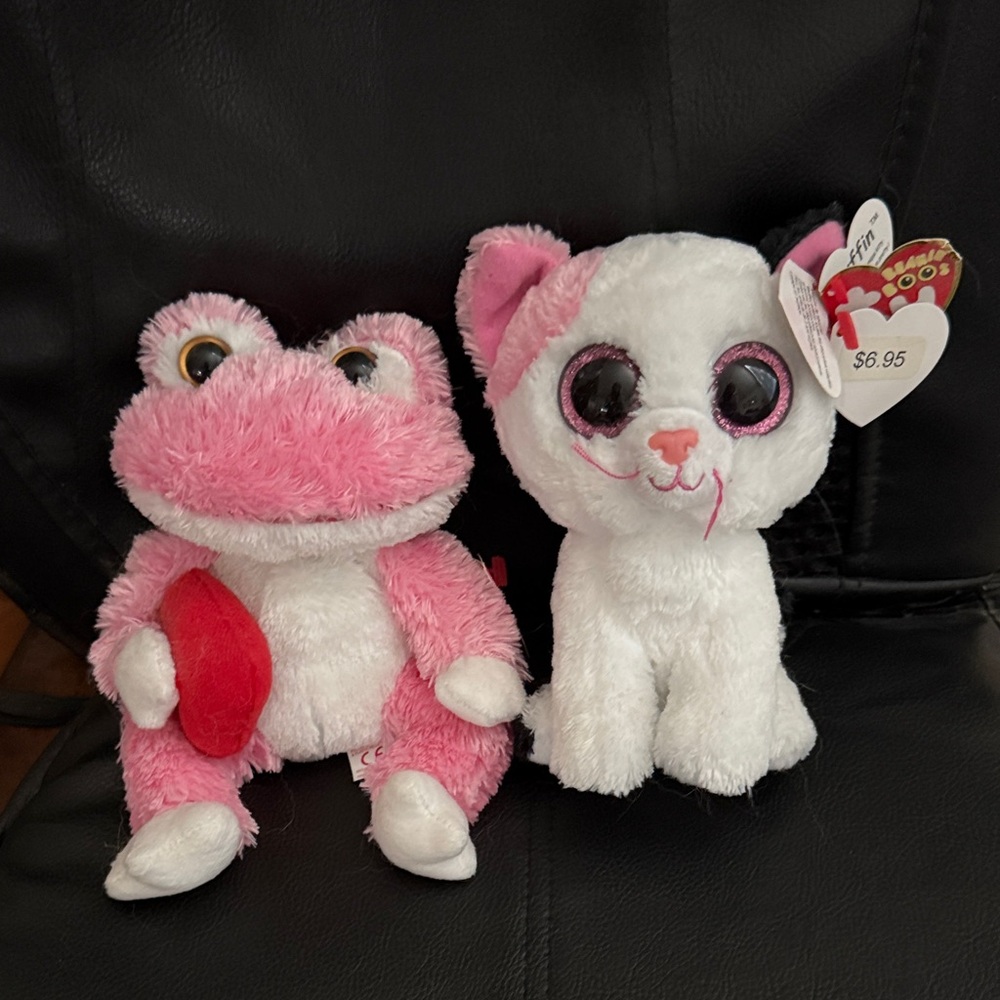 Two Ty Beanie Babies
Selling as set

Pink and White Plush Frog and Cat Toy Set